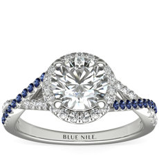 Anillo de compromiso con zafiro y halo de diamantes con diseño retorcido en oro blanco de 14 k (1/6 qt. total)